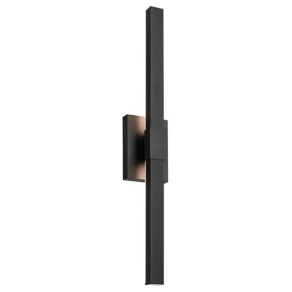 The Nocar combines modern design with practical functionality, featuring energy-efficient integrated LED technology and ADA compliance. Its 30-inch height makes a bold architectural statement while the textured black finish resists outdoor elements.