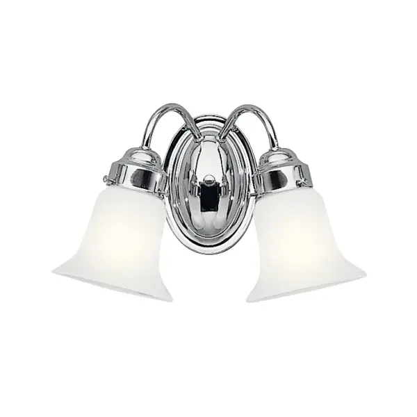 This 2-light vanity fixture blends timeless chrome finish with clean lines and reversible installation. The cased opal glass diffuses light evenly, making it ideal for task lighting in bathrooms of any style.