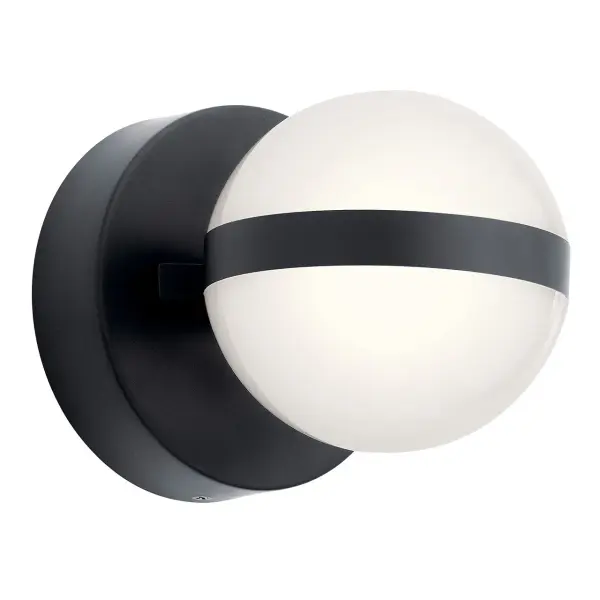 The Brettin Wall Sconce combines contemporary minimalist design with energy-efficient integrated LED technology. Its compact 5.25-inch profile and matte black finish make it ideal for modern bathrooms and hallways.