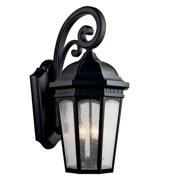 The Courtyard 3-Light Outdoor Wall Light combines traditional styling with durable wet-rated construction. Its textured black finish and clear seeded glass create welcoming illumination for entryways and outdoor living spaces.