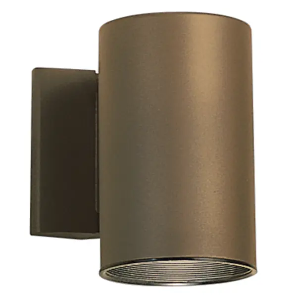 This sleek outdoor wall sconce combines contemporary styling with practical dark sky compliance. The metal cylinder shade directs light downward while the compact 7-inch height fits tight spaces perfectly.