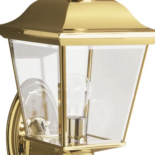 The Bay Shore combines traditional elegance with durable outdoor performance. Its polished brass finish and clear beveled glass create sophisticated curb appeal while wet-rated construction ensures reliable year-round use. - alternate view