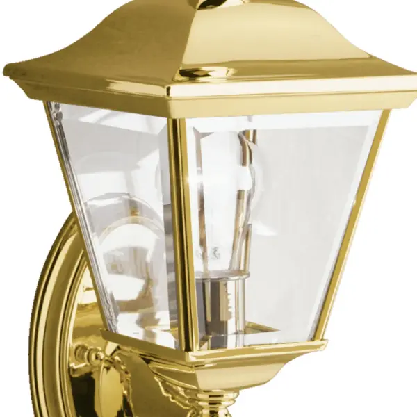 The Bay Shore Outdoor Wall Light combines traditional craftsmanship with weather-resistant durability. Its polished brass finish and clear beveled glass create elegant illumination for entryways and outdoor living spaces. - alternate view