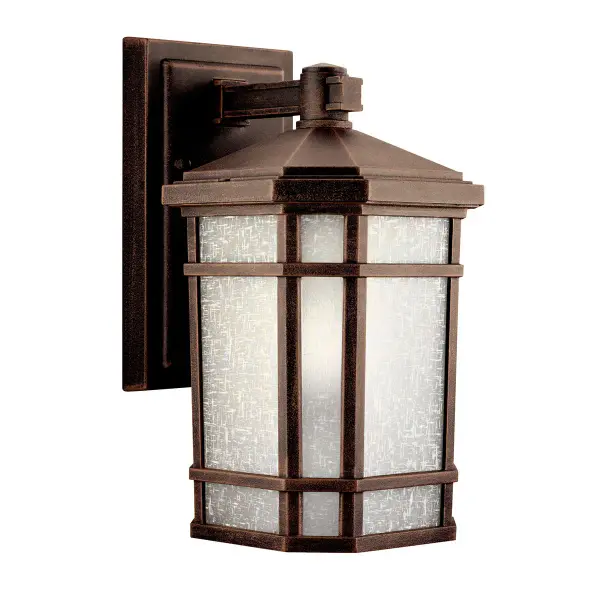The Cameron outdoor wall light combines traditional craftsmanship with modern functionality. Its Prairie Rock finish and satin etched glass create a welcoming ambiance for entryways and outdoor spaces.