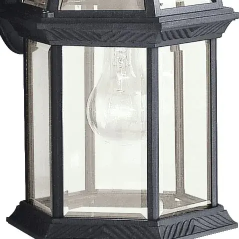 The Barrie outdoor wall light combines traditional styling with practical wet-rated durability. Its clear beveled glass and compact 15.5-inch profile make it ideal for entryways and porches requiring reliable illumination. - alternate view