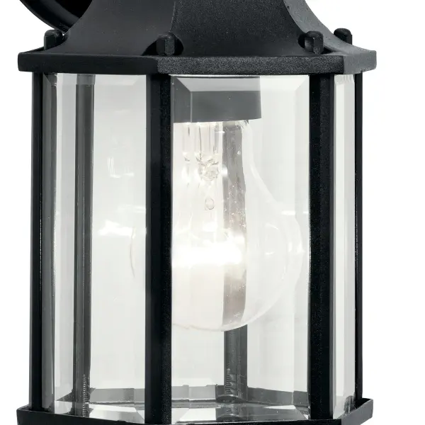 The Chesapeake Outdoor Wall Light combines traditional styling with practical outdoor durability. Featuring clear beveled glass and a wet-rated design, this compact fixture delivers reliable illumination for entryways and exterior spaces. - alternate view