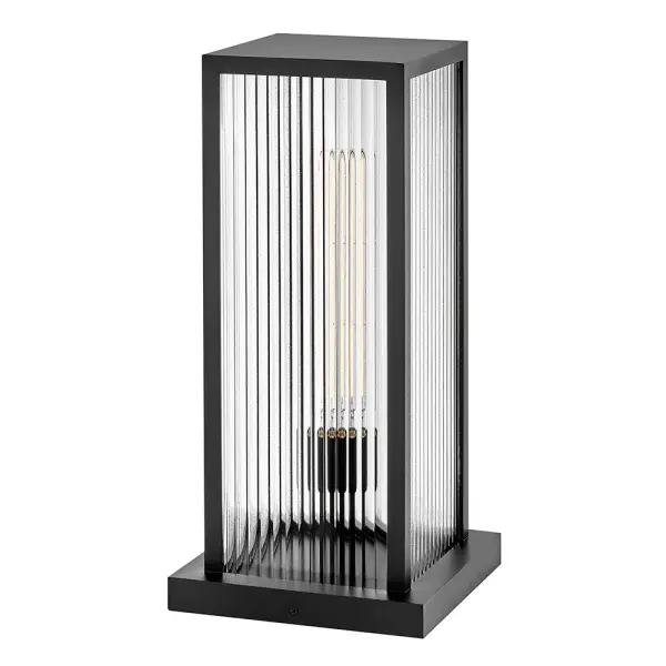 The Torrent LED Pier Mount combines contemporary design with timeless appeal through its distinctive clear ribbed glass and durable aluminum construction. Perfect for illuminating entryways, driveways, and outdoor columns.