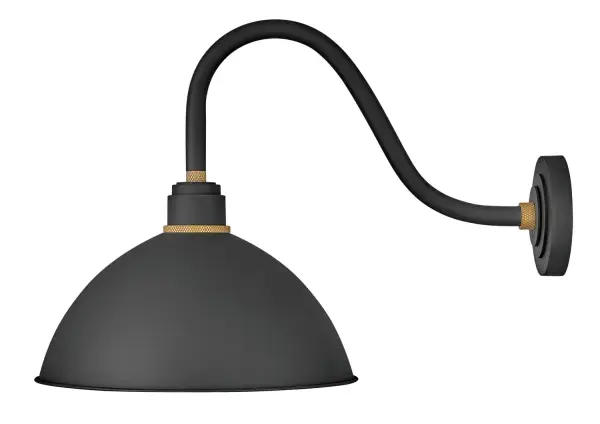 The Foundry Dome combines classic barn light styling with contemporary LED technology. Its textured black aluminum construction with brass accents delivers authentic industrial character while the wet-rated design ensures reliable outdoor performance.