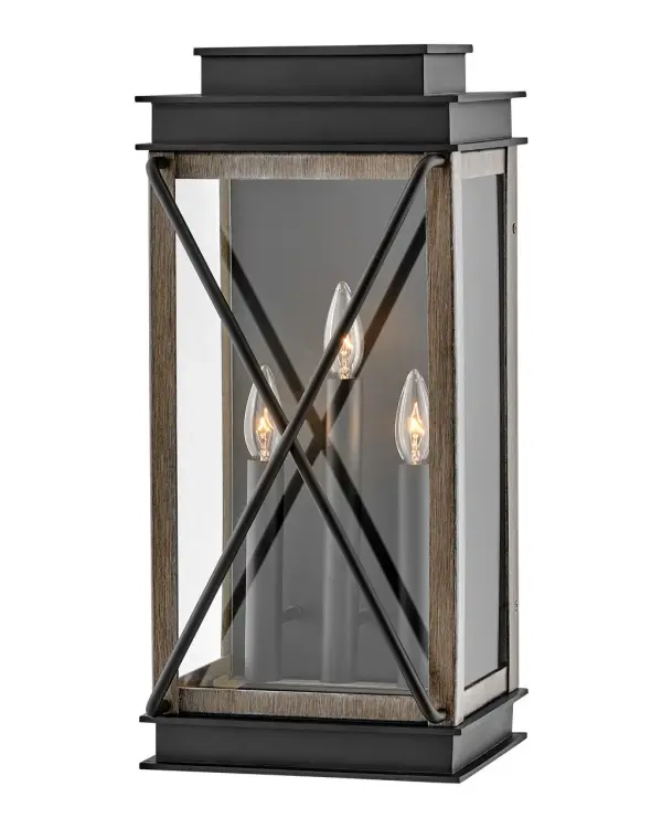 The Montecito LED wall sconce combines modern design with timeless appeal through its cast aluminum frame and polished reflector. The Museum Black finish delivers sophisticated curb appeal while wet-rated construction ensures reliable outdoor performance.