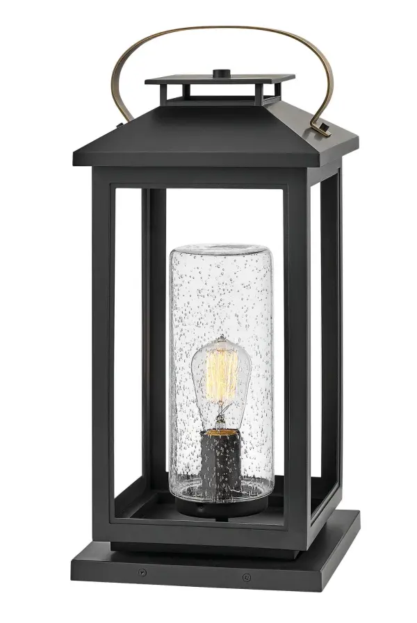 The Atwater LED Pier Mount combines classic coastal design with modern durability. Its composite construction resists rust and corrosion, while brass accents and clear seedy glass create a sophisticated faux candle effect.