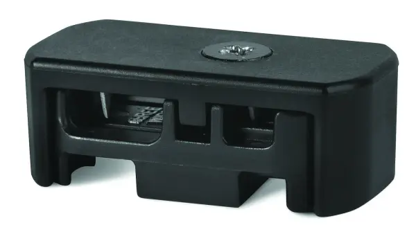 A compact composite connector designed for landscape lighting installations. Provides reliable electrical connections for outdoor lighting systems with weather-resistant construction.