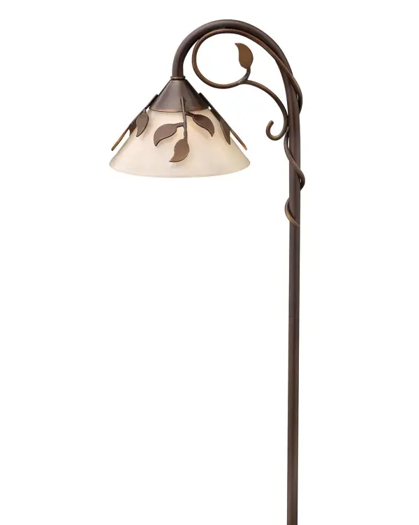 The Ivy LED Path Light combines classic brass construction with energy-efficient LED technology. Its copper bronze finish and light amber glass create a warm, inviting ambiance while providing reliable pathway illumination.