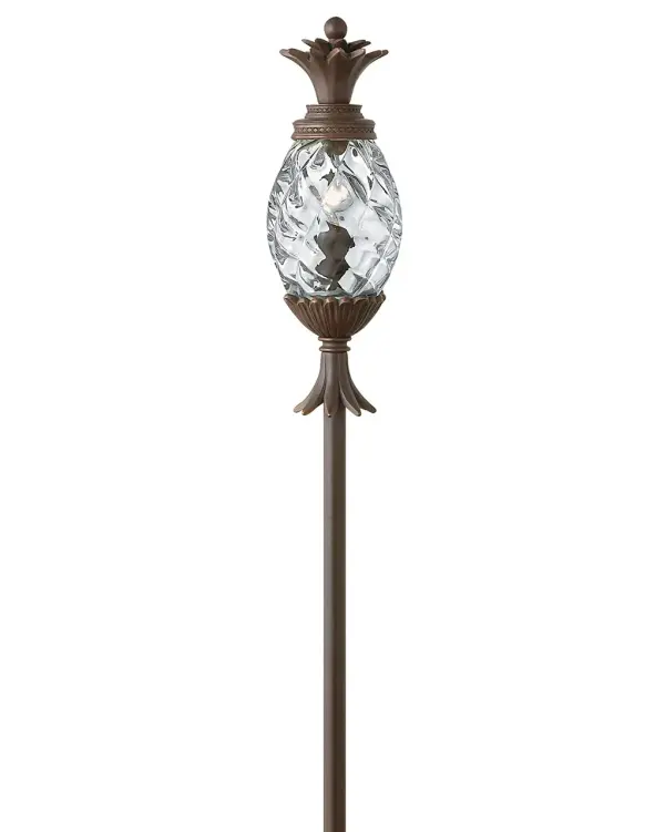 The Plantation path light brings sophisticated outdoor elegance with its ornate pineapple-shaped design and decorative cast detailing. Energy-efficient LED technology delivers warm 2700K light in a durable wet-rated fixture.