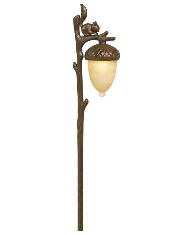 The Squirrel path light combines traditional styling with modern LED efficiency. Its compact aluminum construction and champagne glass shade deliver warm 2700K lighting perfect for walkways and garden paths.