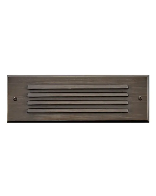 This solid brass step light combines rugged durability with sleek design. The louvered face plate and etched glass lens provide safe, comfortable illumination for outdoor steps while withstanding extreme weather conditions.