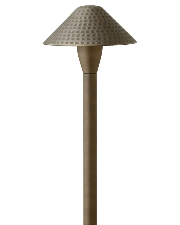The Hardy Island Path Light combines rugged durability with refined design. Solid cast brass construction withstands extreme weather while the clear glass and warm LED create inviting illumination for walkways and outdoor spaces.