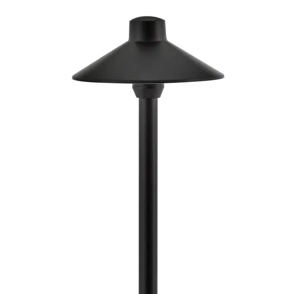 The Hardy Island path light combines solid cast brass construction with a sophisticated satin black finish, designed to withstand extreme weather while providing warm LED illumination for walkways and outdoor spaces.
