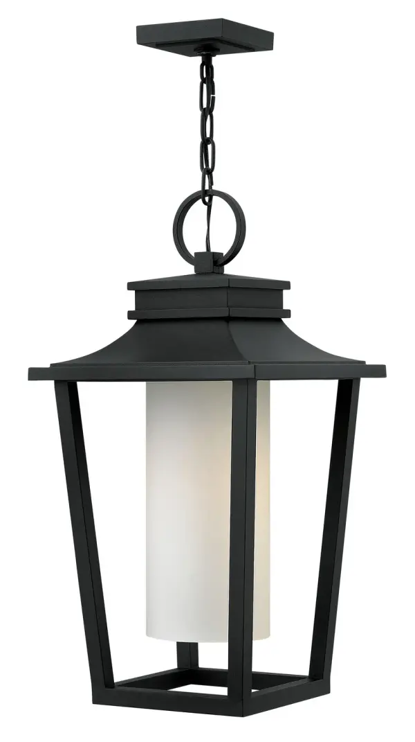 The Sullivan combines clean minimalist design with traditional lantern charm. Cast aluminum construction and etched opal glass create a sophisticated outdoor lighting solution that works in both residential and commercial settings.