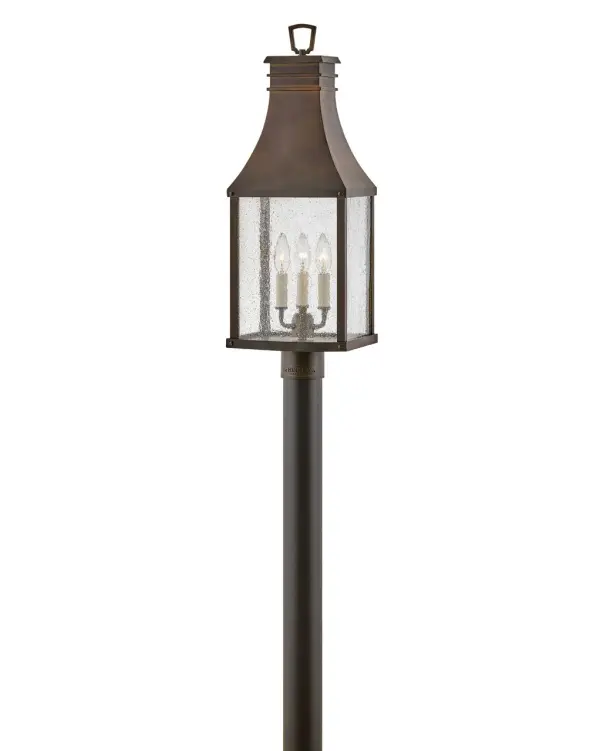 The Beacon Hill post lantern brings timeless elegance to outdoor spaces with its English lantern-inspired design. The blackened copper finish and heavily seeded glass create authentic Old World character while LED technology provides modern efficiency.