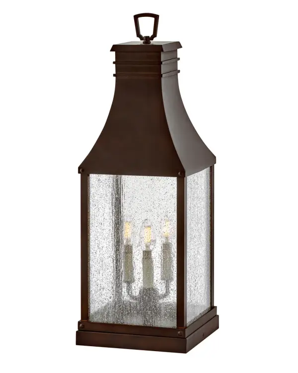 The Beacon Hill pier mount combines Old World charm with contemporary LED technology. Its heavily seeded glass and blackened copper finish create authentic period character, while wet-rated construction ensures durability in all weather conditions.