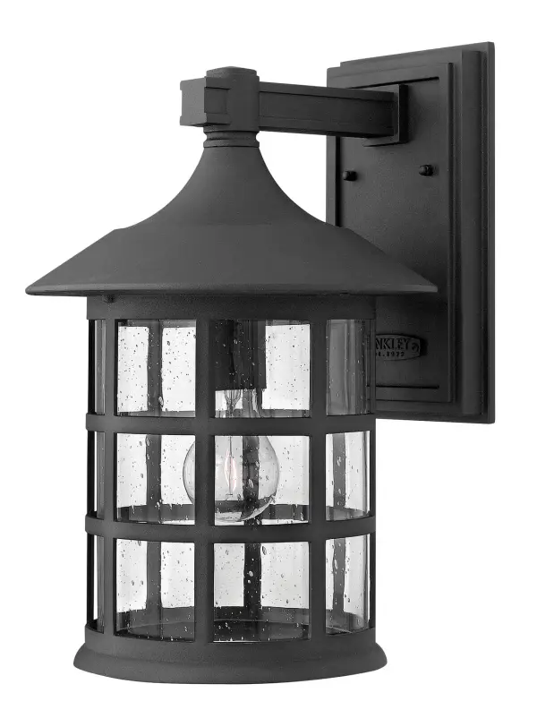 The Freeport LED wall lantern combines timeless traditional styling with energy-efficient LED technology. Its cast aluminum construction and wet-rated design ensure durability in coastal and harsh weather conditions.