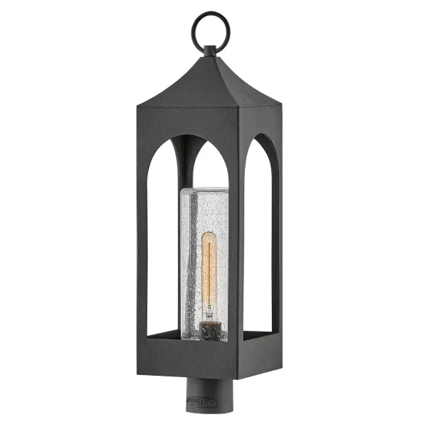 The Amina LED Post Lantern combines timeless lantern styling with contemporary LED technology. Its arched windows and seedy glass create a warm, candle-like glow, while durable aluminum construction ensures longevity in outdoor conditions.