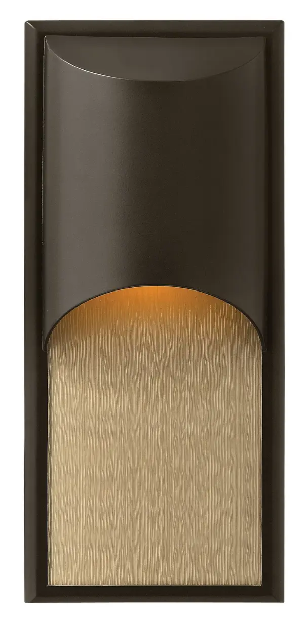 The Cascade LED Wall Sconce combines contemporary design with practical versatility. Its aluminum construction and amber rain glass create a warm, indirect lighting effect suitable for both interior and exterior applications.