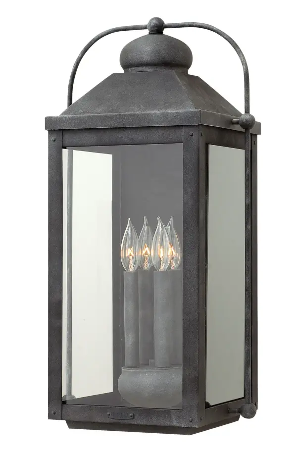 The Anchorage LED Wall Mount combines vintage charm with contemporary LED technology. Its solid aluminum construction and aged zinc finish deliver durability and timeless appeal for outdoor spaces.