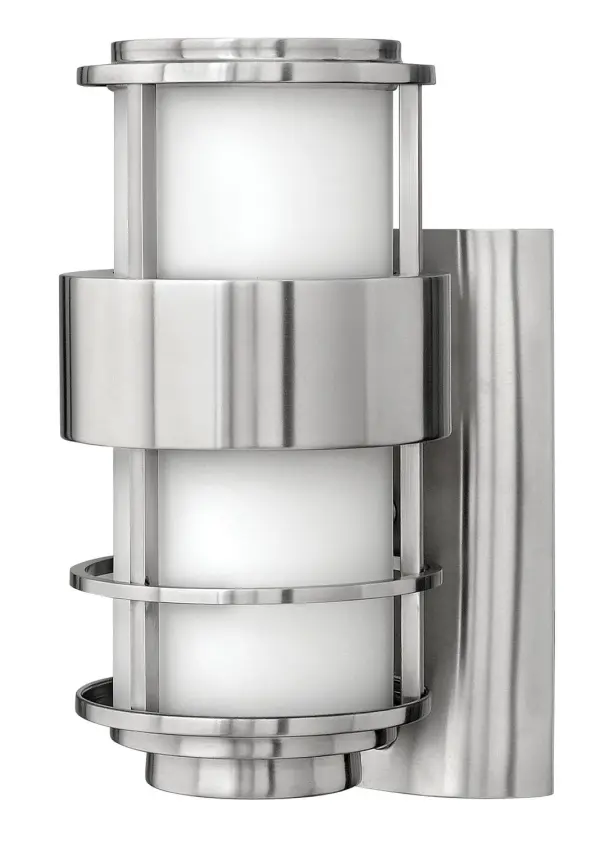 The Saturn LED wall mount combines contemporary aesthetics with practical outdoor lighting. Its intersecting lines and etched opal glass create visual interest while the stainless steel construction ensures durability in wet locations.