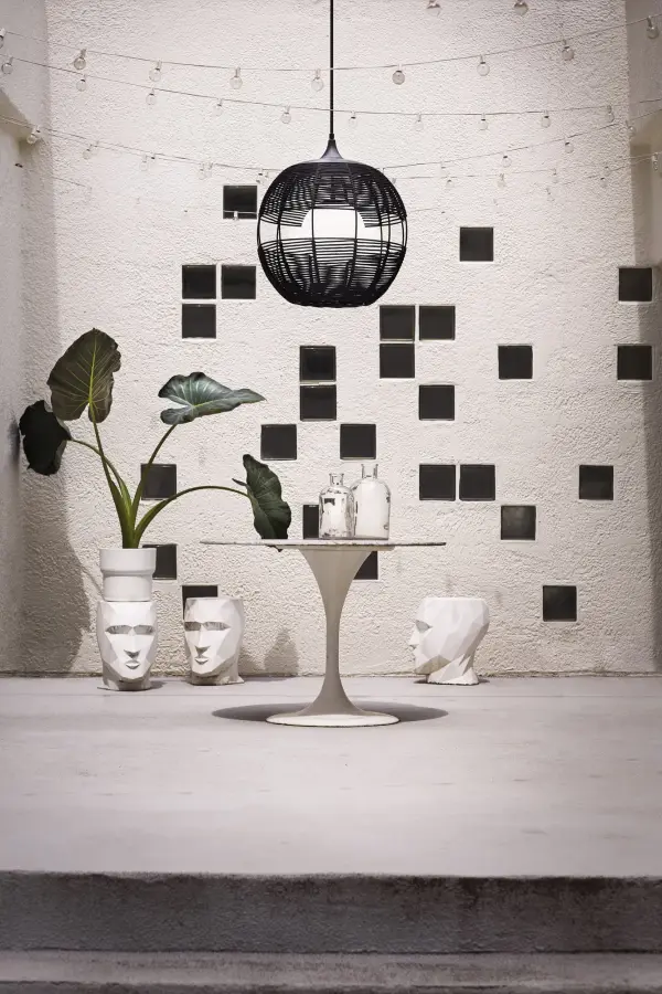 Maddox boasts an edgy, bohemian aesthetic with an open-weave design and geometric shape. This orb pendant features weather-resistant nylon rope in Black or Natural with an etched opal globe nestled inside. Maddox casts the perfect outdoor ambient light to accentuate modern outdoor living spaces. - alternate view