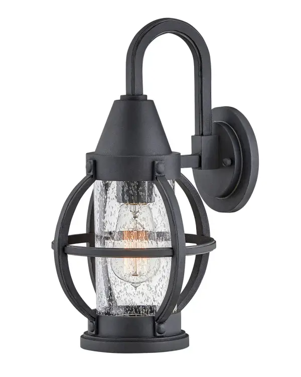 The Chatham LED wall lantern brings timeless onion-style design to outdoor spaces with weather-resistant construction and energy-efficient LED technology. Its seedy glass and refined scroll arm create inviting ambiance.
