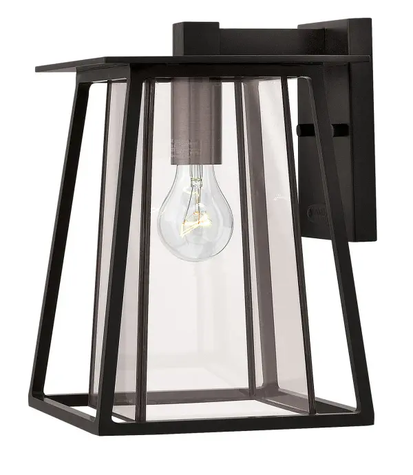 The Walker LED Wall Mount combines rugged American West aesthetics with modern LED efficiency. Its angular aluminum and brass construction with two-tone finish creates a striking statement for outdoor spaces.