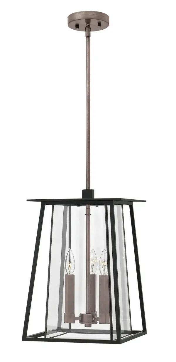 Walker brings rugged American West style with strong angular lines and two-tone aluminum-brass construction. The minimalist frame showcases clear bound glass, creating a versatile statement piece for mountain cabins or mid-century homes.