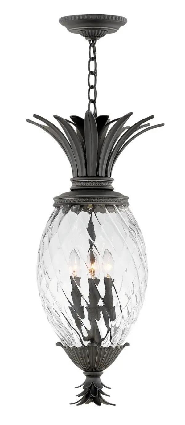 The Plantation LED Hanging Lantern combines ornate traditional design with contemporary LED technology. Its signature pineapple-shaped elements and decorative cast detailing create sophisticated curb appeal while wet-rated construction ensures durability.