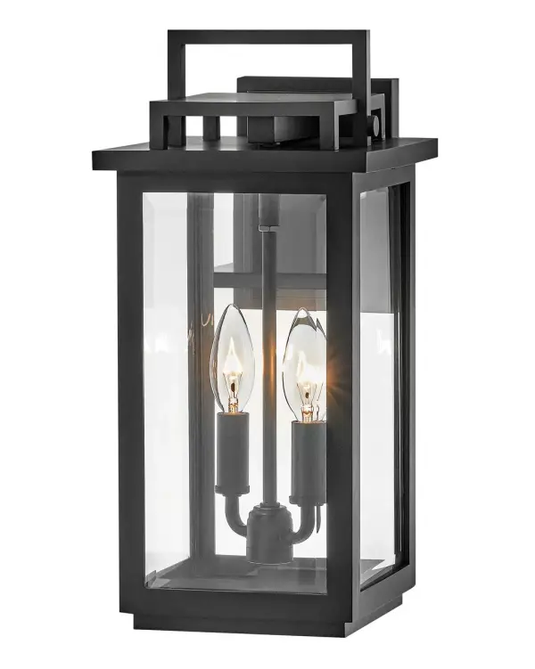 The Winthorpe LED wall sconce combines clean transitional lines with coastal durability. Its beveled glass panels beautifully refract light while the composite construction and anti-fading finish resist rust and corrosion, backed by a 5-year warranty.