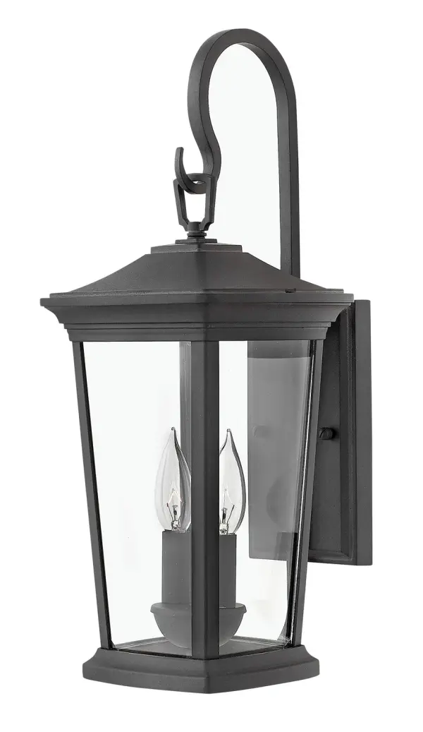 The Bromley LED Wall Mount combines timeless traditional design with contemporary LED technology. Its die-cast aluminum construction and wet-rated certification ensure durability in any weather, while the decorative scrolled arm adds sophisticated charm to exterior spaces.