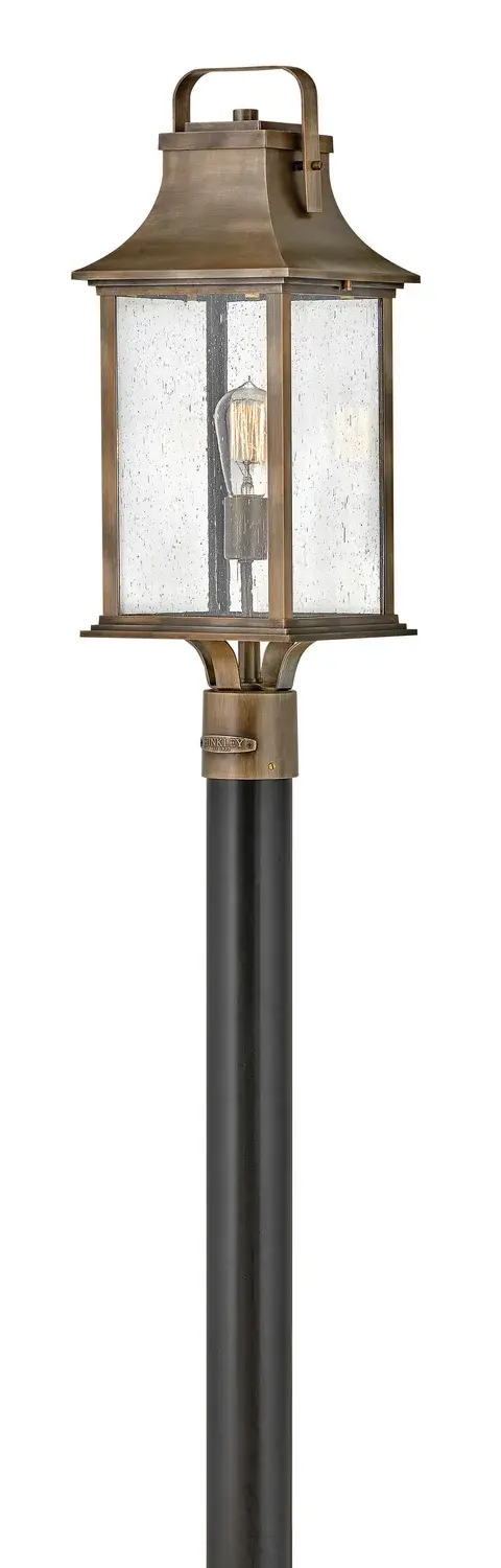 The Grant LED Post Lantern combines classic design with modern LED technology. Its curved roof, oversized handle, and clear seedy glass create a dignified presence while the burnished bronze finish adds warmth and timeless appeal.