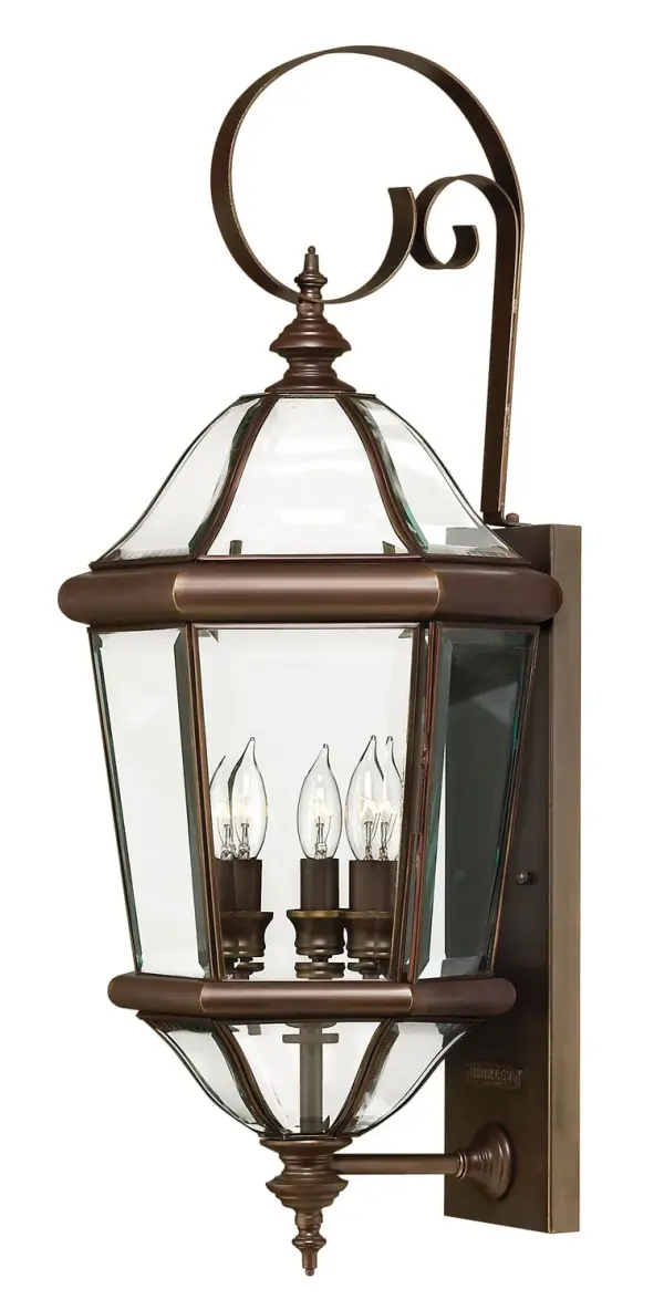 The Augusta LED Wall Mount combines timeless traditional design with modern LED efficiency. Its solid brass construction, copper bronze finish, and beveled glass panels create sophisticated curb appeal.