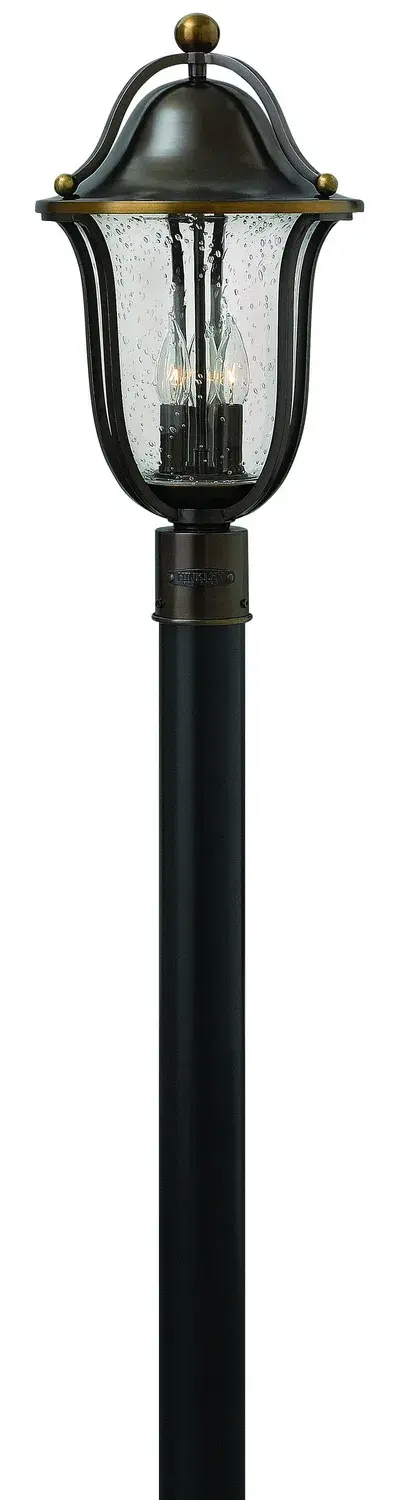 The Bolla LED Post Lantern combines timeless traditional design with modern LED technology. Solid brass construction with clear seedy glass creates warm, inviting illumination for outdoor spaces.