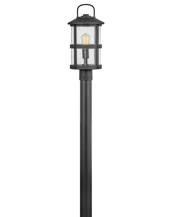 The Lakehouse LED Post Lantern combines coastal aesthetics with modern LED efficiency. Its cast aluminum construction and clear seedy glass create a relaxed, nautical ambiance perfect for outdoor pathways and entryways.