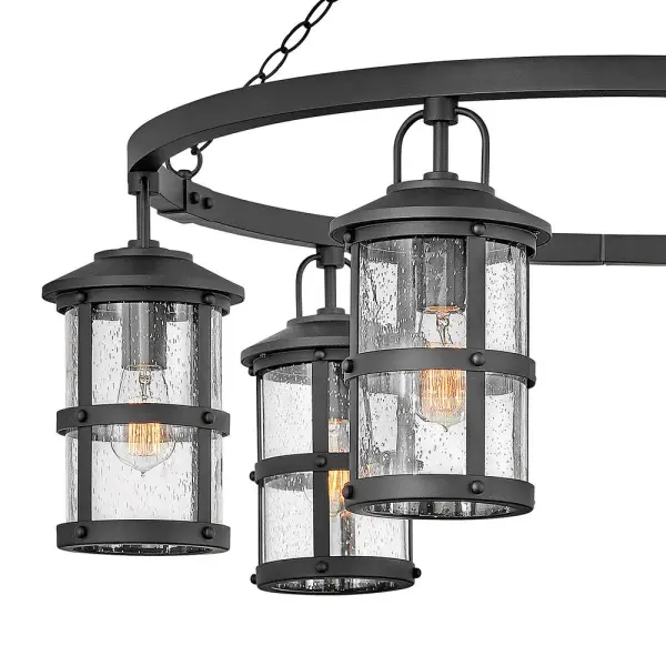 The look is relaxed, but the components of Lakehouse are quietly satisfying. Lakehouse features a distressed, Aged Zinc with Driftwood Gray or a Black finish accompanied by clear seedy glass. Cast aluminum construction ensures Lakehouse will withstand for years. Blissfully simple, yet all the details are memorable. - alternate view