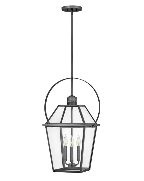 The Nouvelle combines handcrafted solid brass construction with modern LED technology. Its blackened brass cage and tapered clear glass panels create a sophisticated look that bridges traditional and contemporary design.