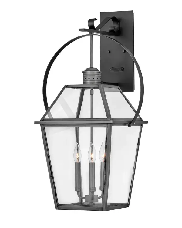 The Nouvelle LED Wall Mount combines Old World craftsmanship with modern LED efficiency. Its solid brass construction and four-sided clear glass panels create a sophisticated presence that works equally well on traditional and contemporary exteriors.