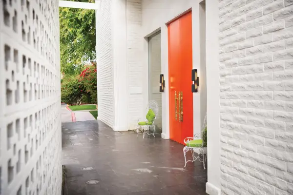 Contour is sleek, sculptured and most definitely sophisticated. The low profile is discreet, yet the integrated high performance LED makes an innovative impact both inside and out. Illumination glows up and down from the cast canopy, and the louvres are highlighted from the inner LED to emphasize the smooth curves and clean lines of Contour. Black, Bronze or Cement Gray finishes complement any decor. - alternate view