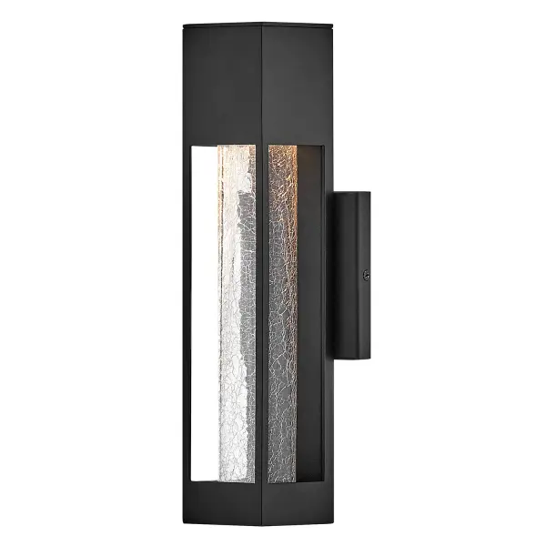 The Vapor LED Wall Lantern combines modern minimalism with eye-catching crackled glass. Its compact 14-inch profile and wet-rated construction make it ideal for contemporary outdoor spaces requiring both style and durability.