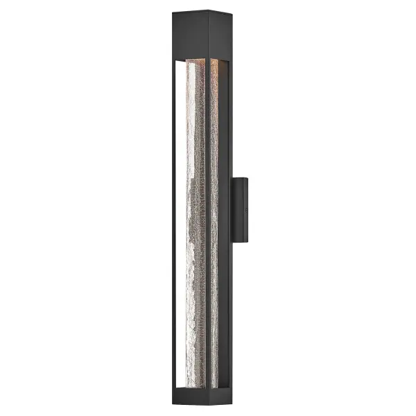 The Vapor LED Wall Lantern combines modern minimalism with dramatic texture through its crackled glass shade and streamlined aluminum construction. Energy-efficient LED technology and wet-rated durability make it ideal for outdoor applications.
