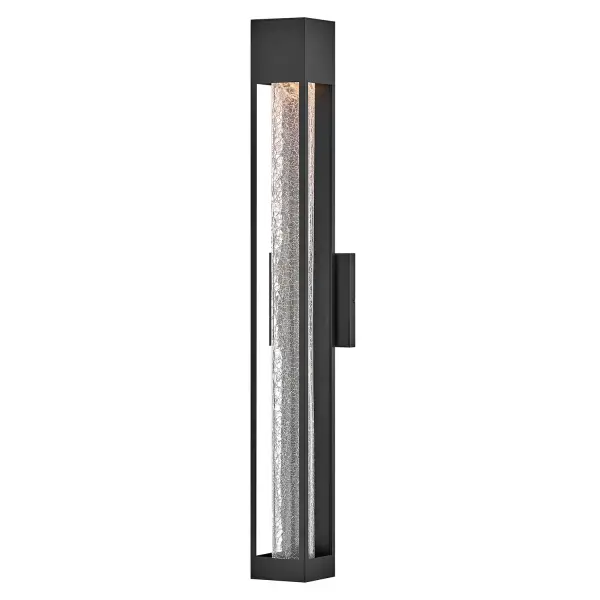 The Vapor LED Wall Lantern combines modern minimalism with dramatic texture through its crackled glass shade and streamlined aluminum construction. Energy-efficient LED technology and wet-rated durability make it ideal for outdoor applications.
