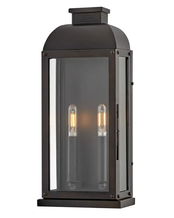 The Tiverton LED Wall Mount brings Southern colonial charm to contemporary outdoor spaces. Its solid brass construction with louvered detailing and clear glass panels creates an authentic lantern aesthetic, while integrated LED technology provides energy-efficient illumination.