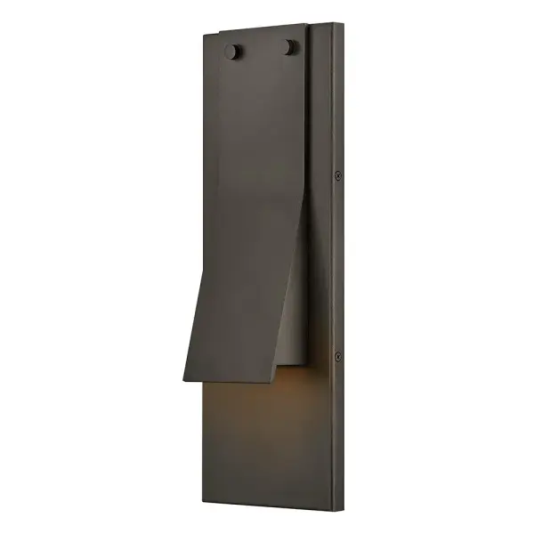 The Fold LED Wall Mount combines contemporary design with eco-conscious Dark Sky compliance. Its sculptural creased form and integrated LED technology deliver 500 lumens of warm light, perfect for entryways and outdoor living spaces.