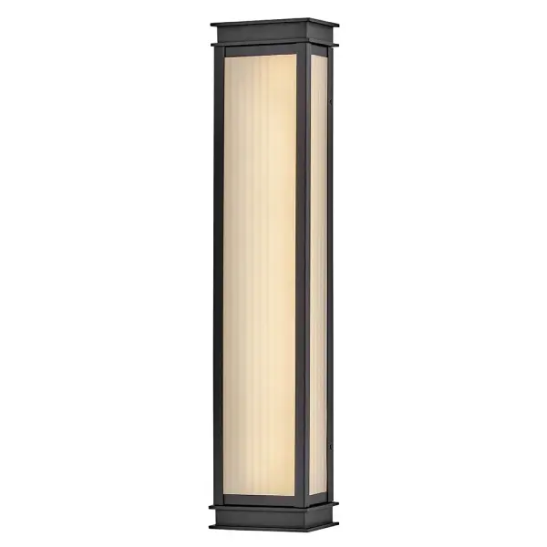 The Rockwell LED Wall Mount combines classic lantern styling with modern LED efficiency. Its ribbed glass and textured black finish create warm ambiance while the integrated LED provides 50,000 hours of maintenance-free illumination.
